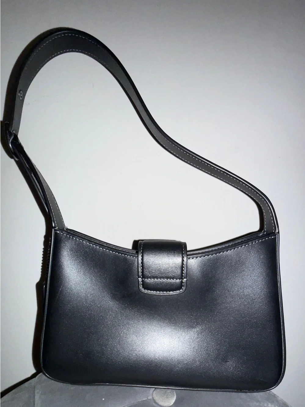Coach “Eliza” Black Leather Shoulder Bag with Tab Closure